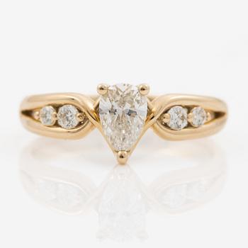 Ring 14K gold with a pear-shaped diamond, accompanied by an IGI report.