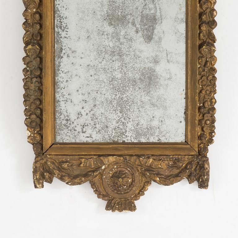 AN 18TH CENTURY MIRROR, probably French.