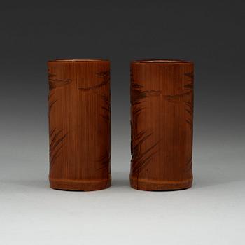 A pair of finely carved small Bamboo brushpots. Qing dynasty 19th century.