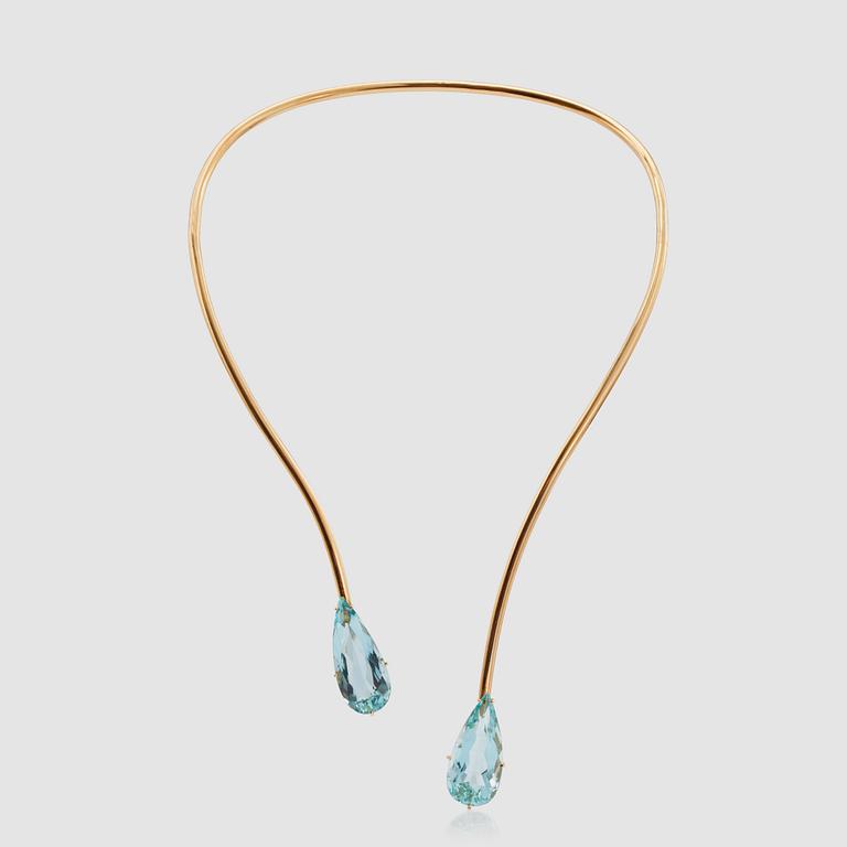 A necklace with two pear-shaped aquamarines.