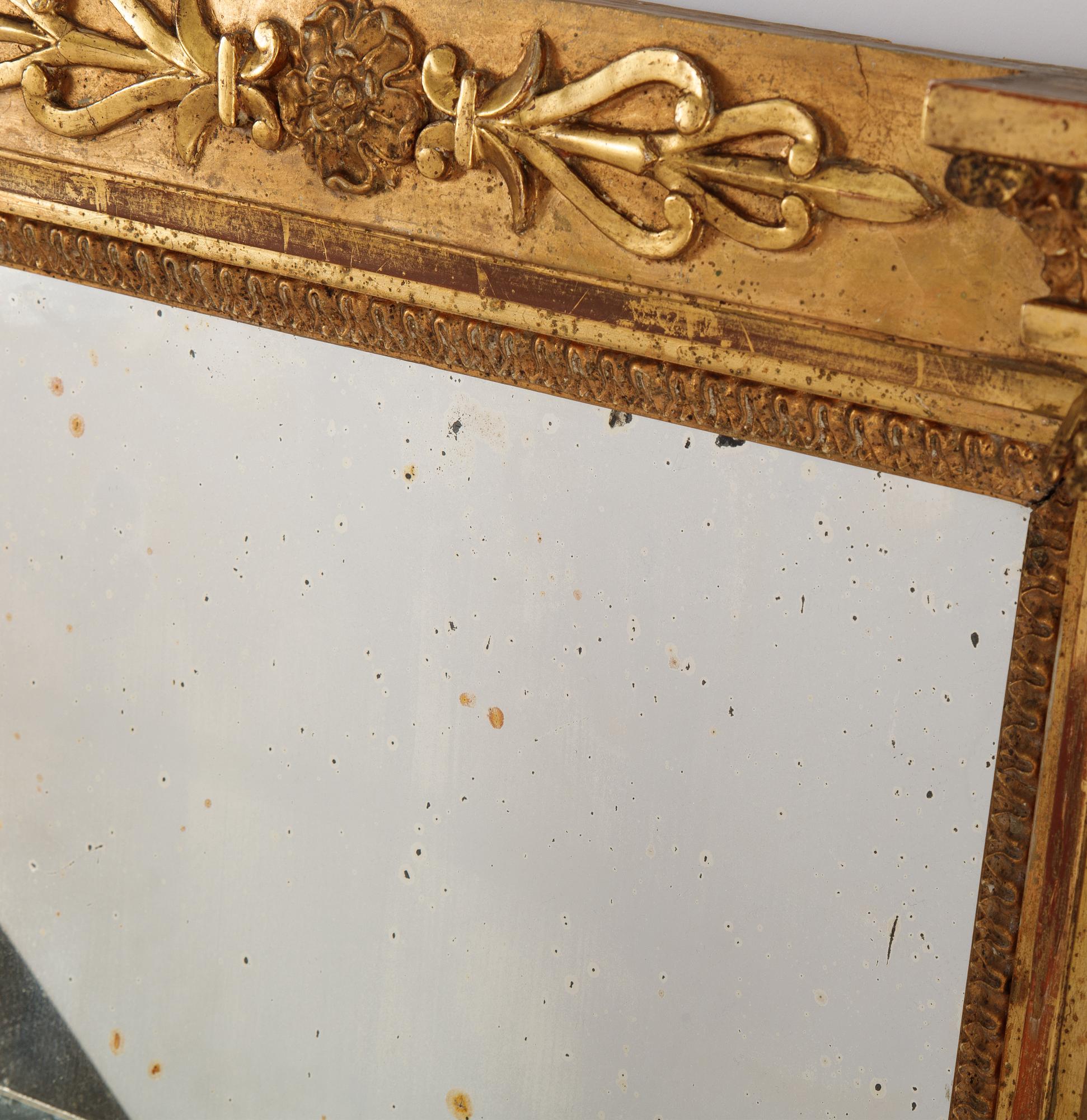 An Swedish Empire mirror, first half of the 19th century, attributed to Petter Gustaf Bylander, (Gothenburg 1802-59).