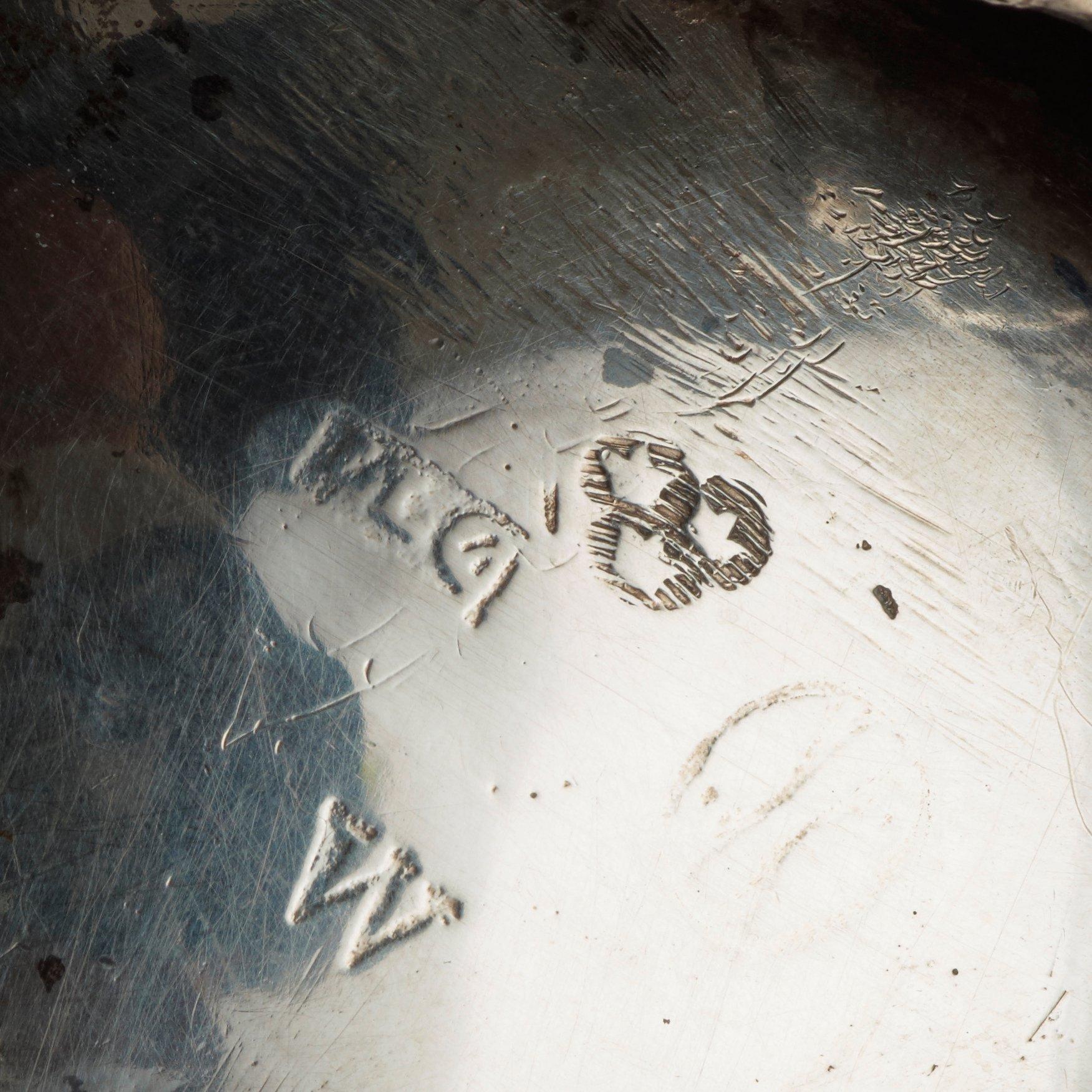 A Swedish 18th century silver sugar-casters, marked Lorentz Lindgren, Borås 1779, and one later copy with false marks.