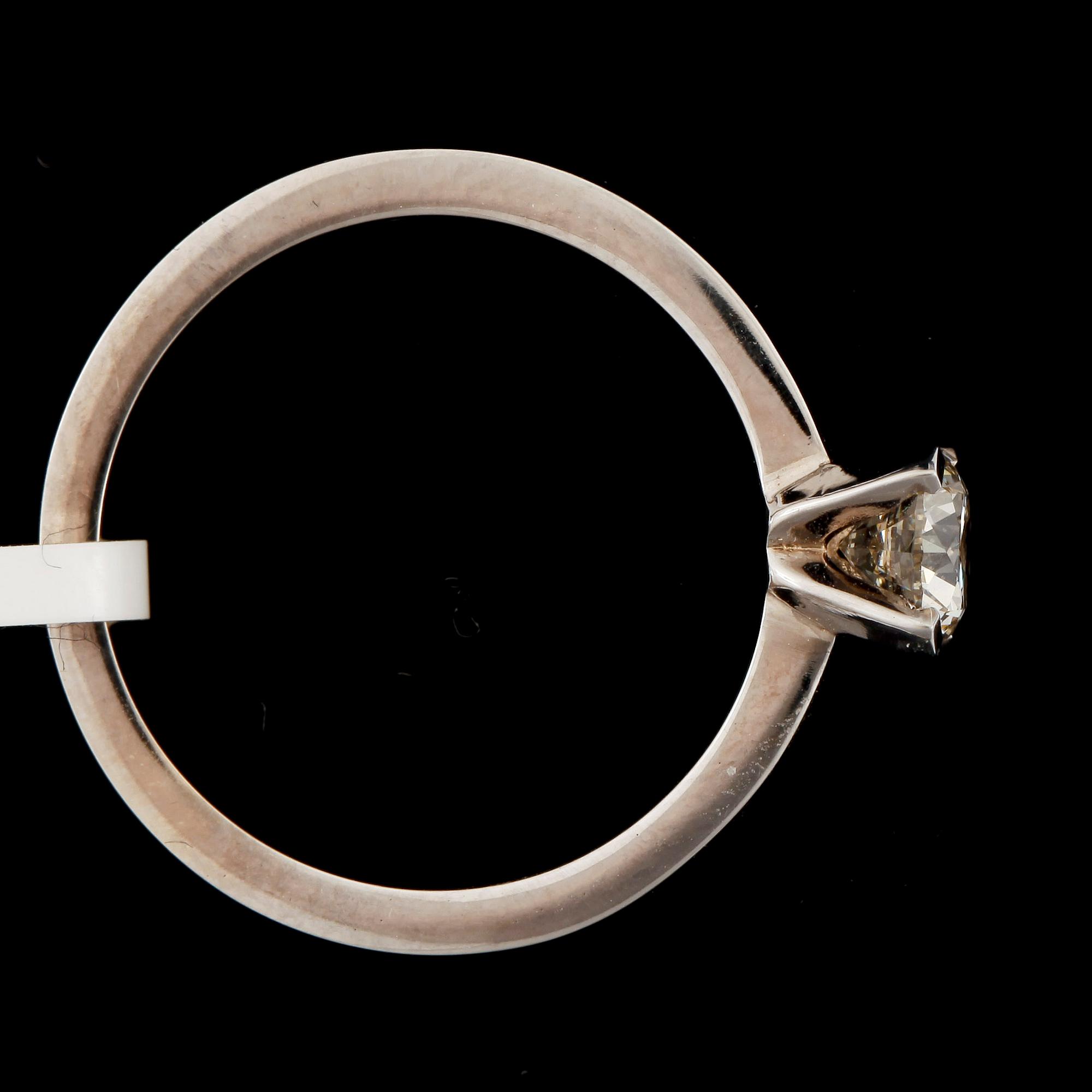 RING, 14k vitguld, med briljantslipad diamant ca0,60ct. Certifikat medföljer. 2000-tal. Vikt ca3,4g.