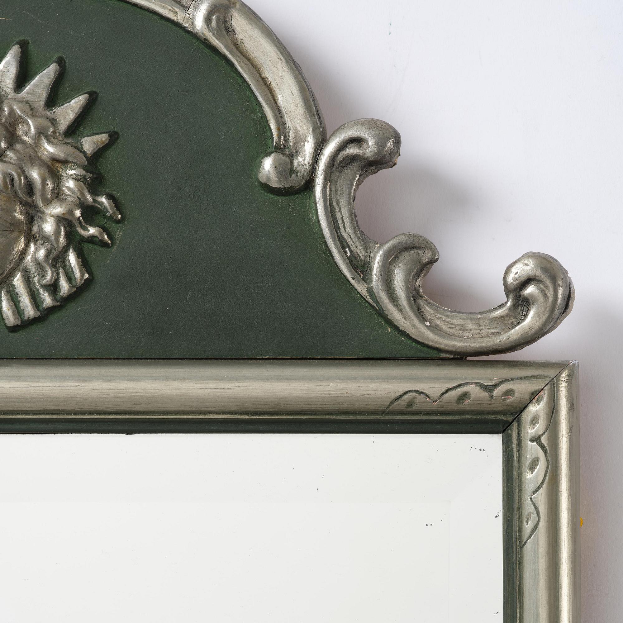 Swedish Grace, a wall mirror.