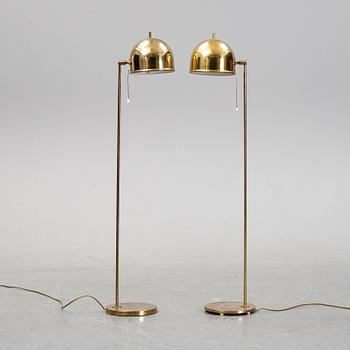 Eje Ahlgren, a pair of model G-075 brass floor lights, Bergboms, 1960's/1970's.