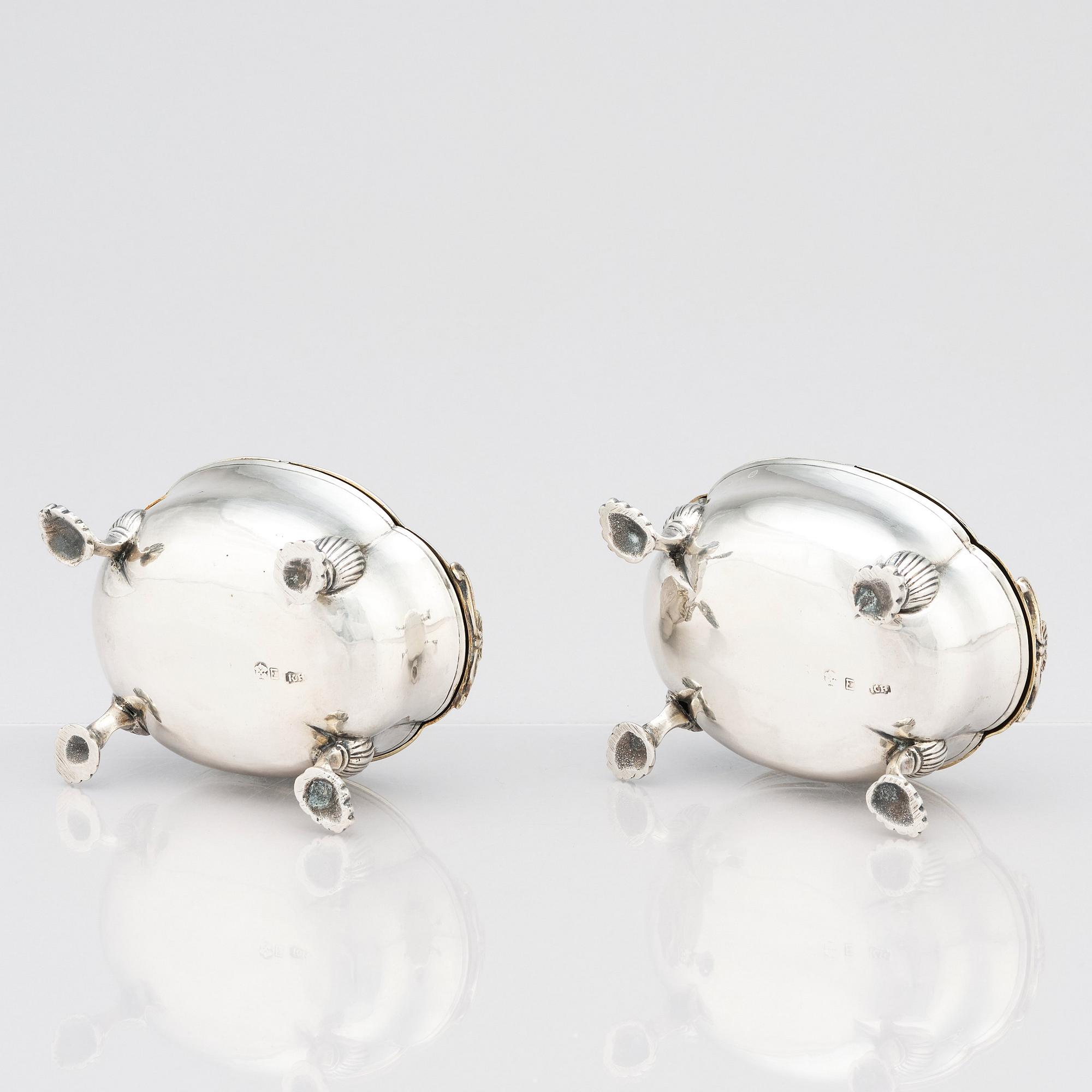 A pair of Latvian Rococo silver salt and pepper stands, marks of Johan Christian Henck (Henke), Riga 1768-80.