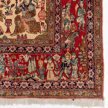 A signed semi-antique pictoral part silk Qum carpet, c. 341 x 224 cm.