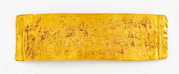 A set of nine presumably modern Egyptian-style gold foil sheets with figures and hieroglyphs.