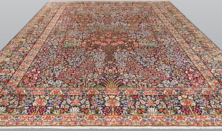 A Kerman Laver carpet, 'Millefleur', approx. 406 x 295 cm.