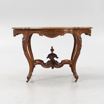 A rococo style center table, second half of the 19th Century.