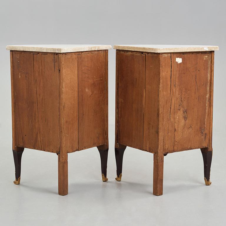 A pair of Louis XVI late 18th century corner cupboards by Léonard Boudin (1735-1804), master in Paris 1761.