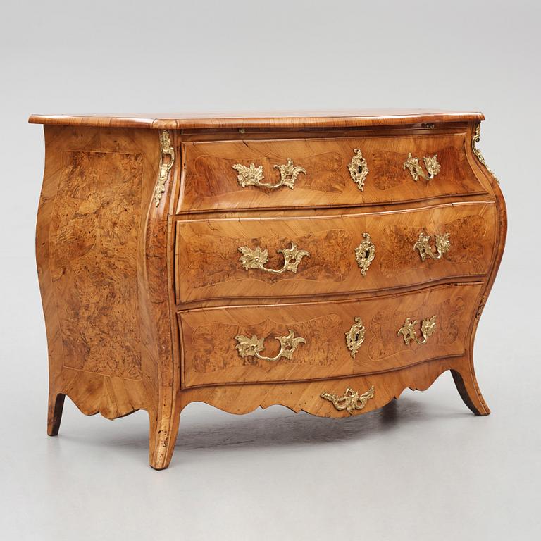 A burr-alder and gilt brass-mounted rococo commode by J. Sjölin (master 1767-85).