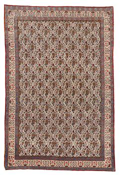 287. A CARPET, a semi-antique Qum, ca 330,5 x 221 cm.