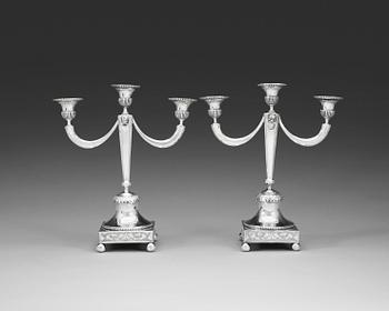 1041. A pair of Swedish late 18th century silver candelabra, marks of Olof Hellberg, Stockholm 1799.