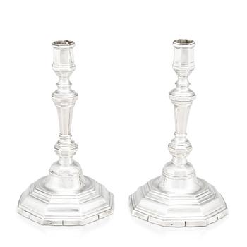 220. A pair of French silver candlesticks. Marks of Antoine Bailly. With charge and decharge marks for Paris 1750-1756.