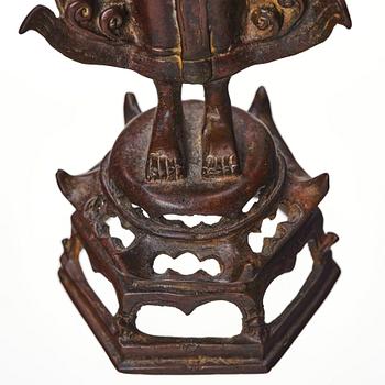 A standing sculpture of buddha, Laos, 18th Century.