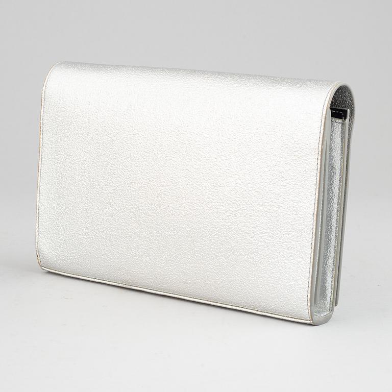 Yves Saint Laurent, a clutch.