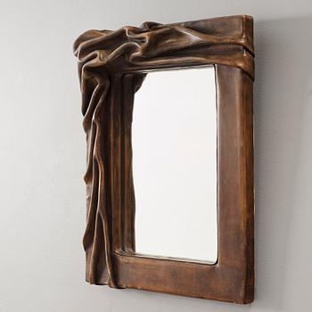 A 20th century leather framed mirror, unknown designer.