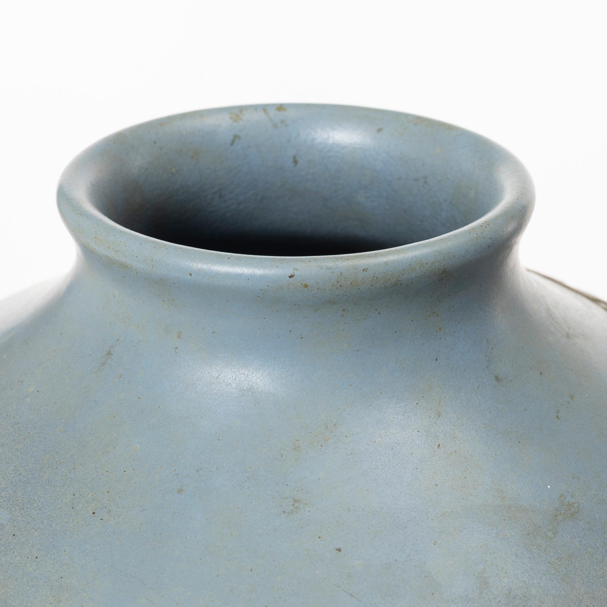 A blue glazed relief vase, possibly Korea, around 1900.