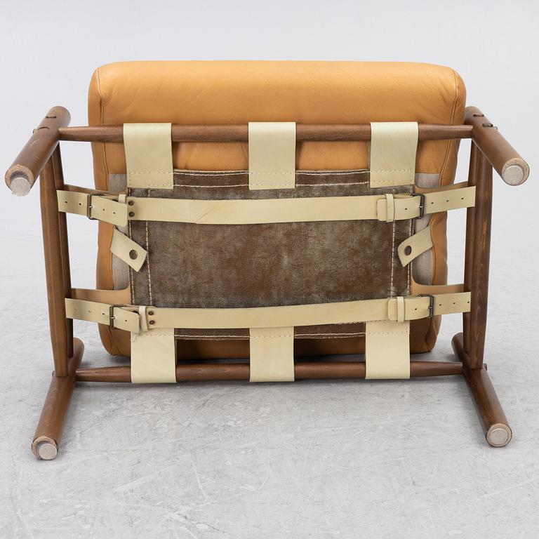 Arne Norell, Armchair with an ottoman, 'Inka', Norell Möbel AB, 1970s.