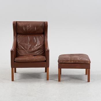 Børge Mogensen, a leather easy chair and foot rest, model 2204, Frederica Stolefabrik, Denmark,