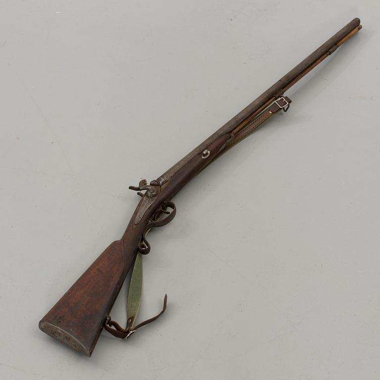 A PERCUSSION LOCK RIFLE, 19th century.