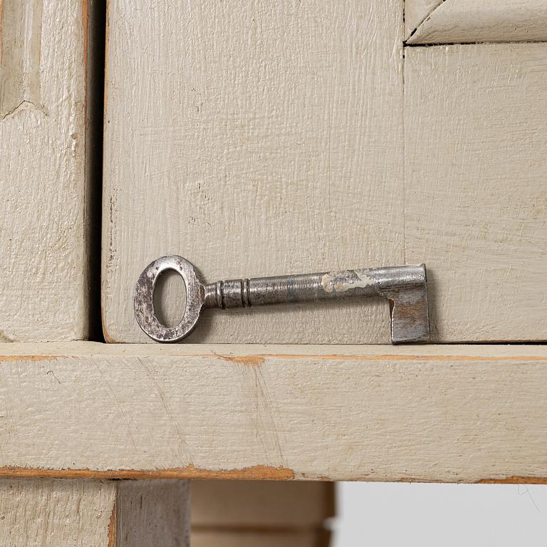 Display cabinet, early 20th century.