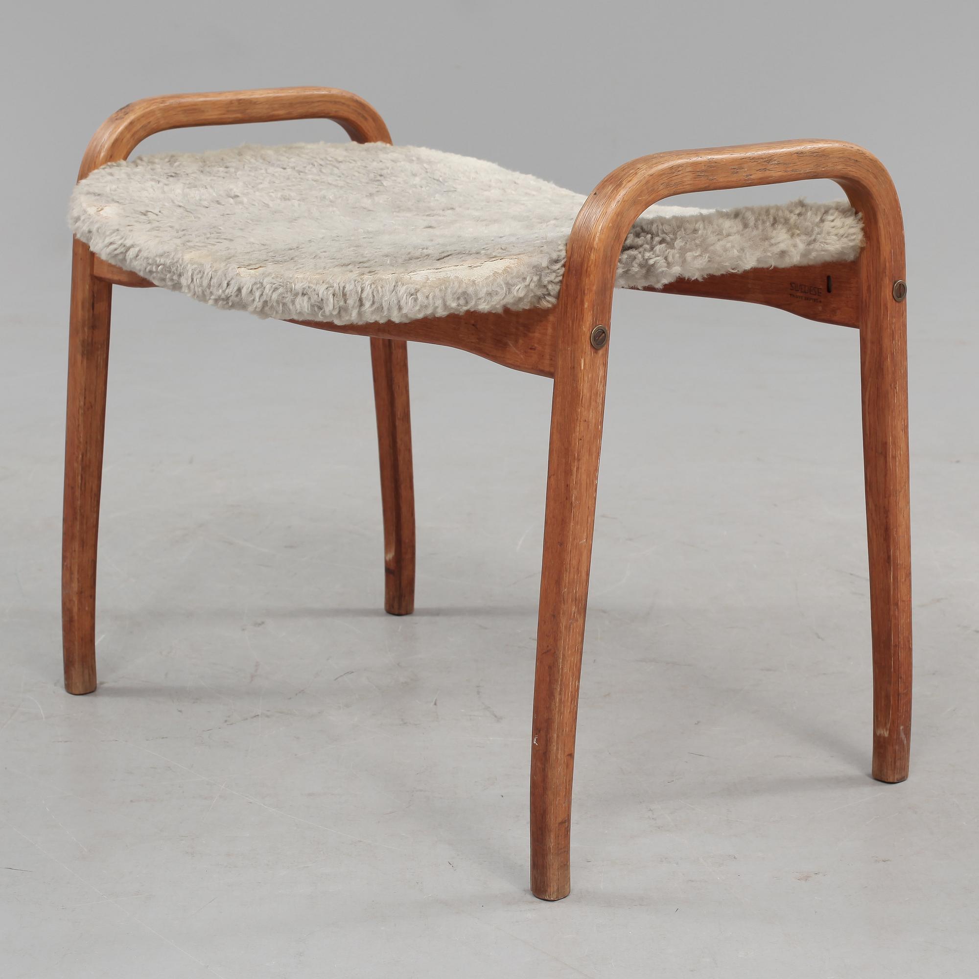 FÅTÖLJ samt FOTPALL, "Lamino", Yngve Ekström, Swedese, 1900-talets fjärde kvartal.