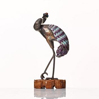 A silver and enamel figure of a crane, first half of 20th Century.