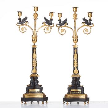 A pair of three-light Empire candelabra, early 19th century .