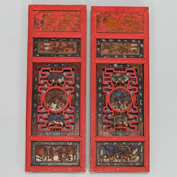 A pair of late Qing dynasty wooden panels, China, 19th/20th century.