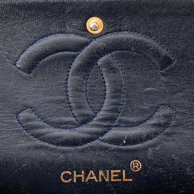 CHANEL, a quilted blue leather "Double Flap" shoulder bag.