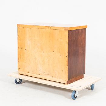 A 1940s Art Deco birch dresser.