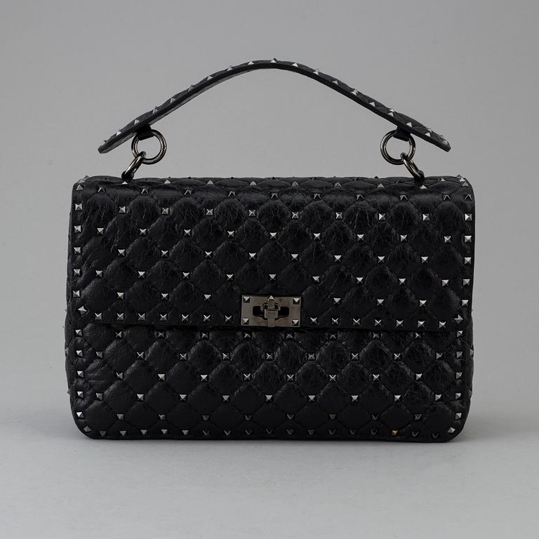 A bag by Valentino, "Rockstud Spike".