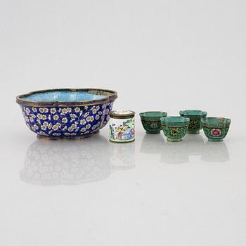 A group of Chinese enamels, including a flower pot, a box and four cups, Qing dynasty, 18th and 19th century.