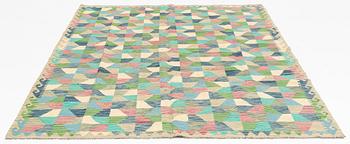 A kilim carpet, 294 x 197 cm.