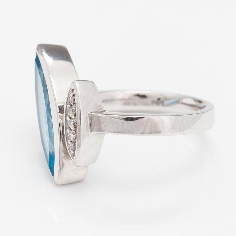 RING, 14K vitguld, topas, diamanter ca 0.05 ct tot.