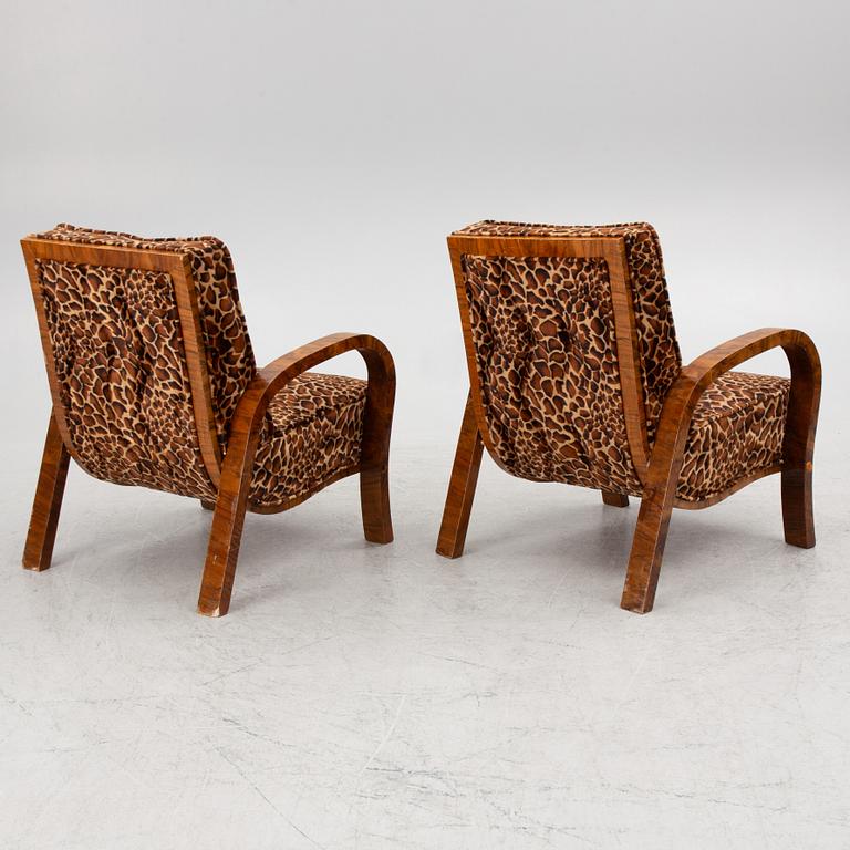 A pair of armchairs, mid-20th Century.