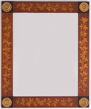 A empire-style miroor from around 1900.