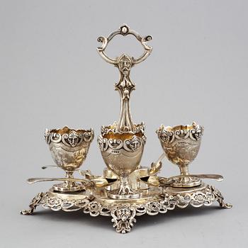 An English silver-gilt egg cruet set, mark of James Charles Edington, London 1857.