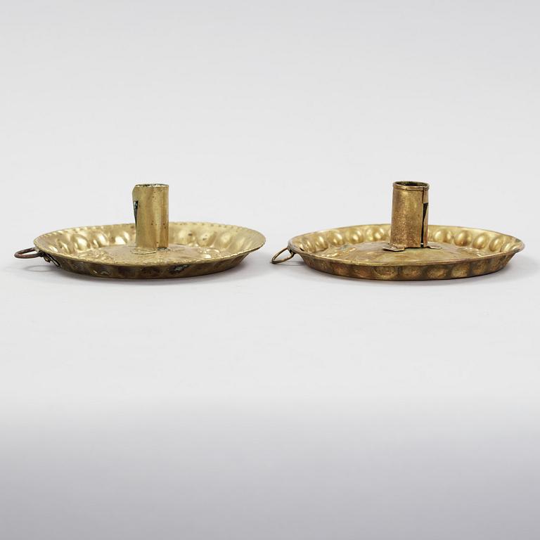 two brass candle holders from the 18th century.