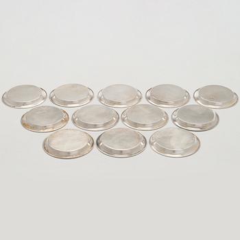 A 12-piece set of silver glass coasters, Kultakeskus, Hämeenlinna 1952. In original fitted case.