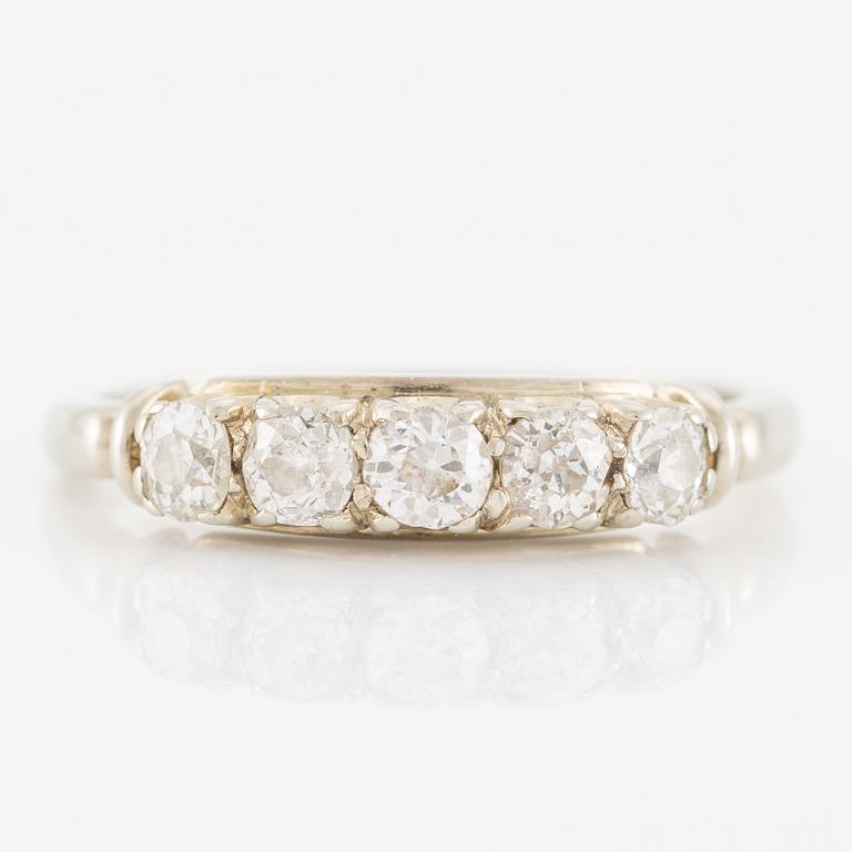 Ring in 18K white gold set with five old-cut diamonds.