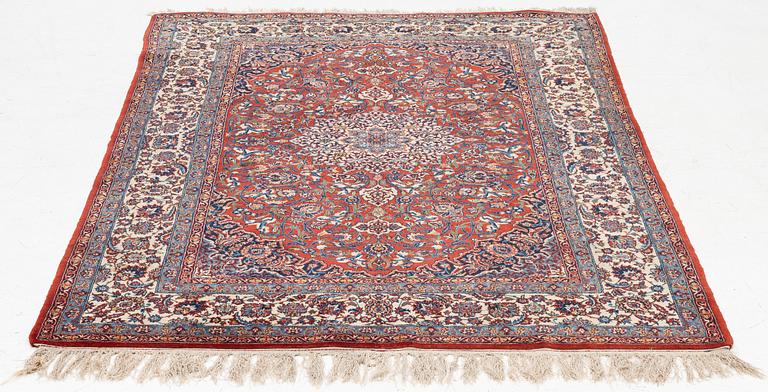 An Isfahan rug, c. 225 x 150 cm.