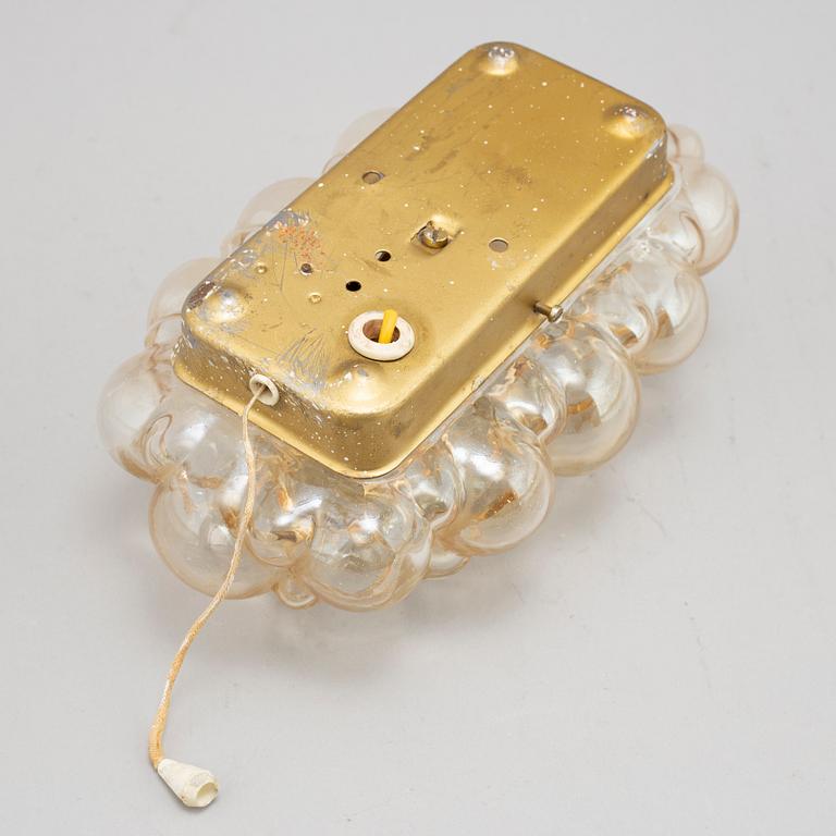 Helena Tynell, a glass wall light and a pair of ceiling lights, Glasshütte Limburg, Germany.