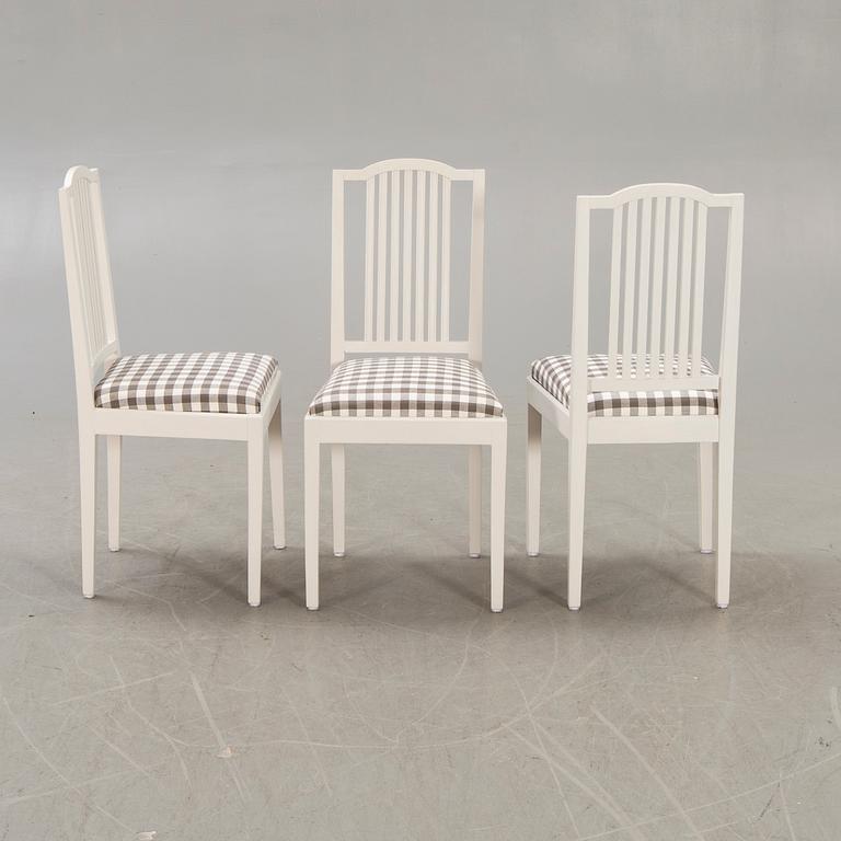 A set of six painted chairs around 1900.