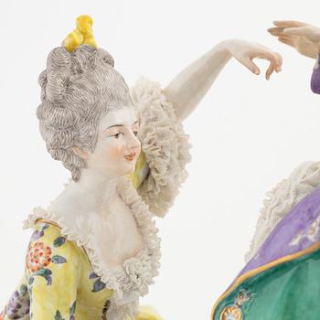 A rococo style porcelain figurine from the early 20th century.