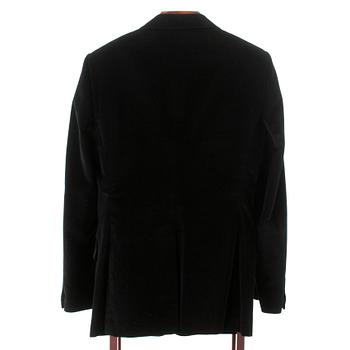 YVES SAINT LAURENT, a black velvet jacket.