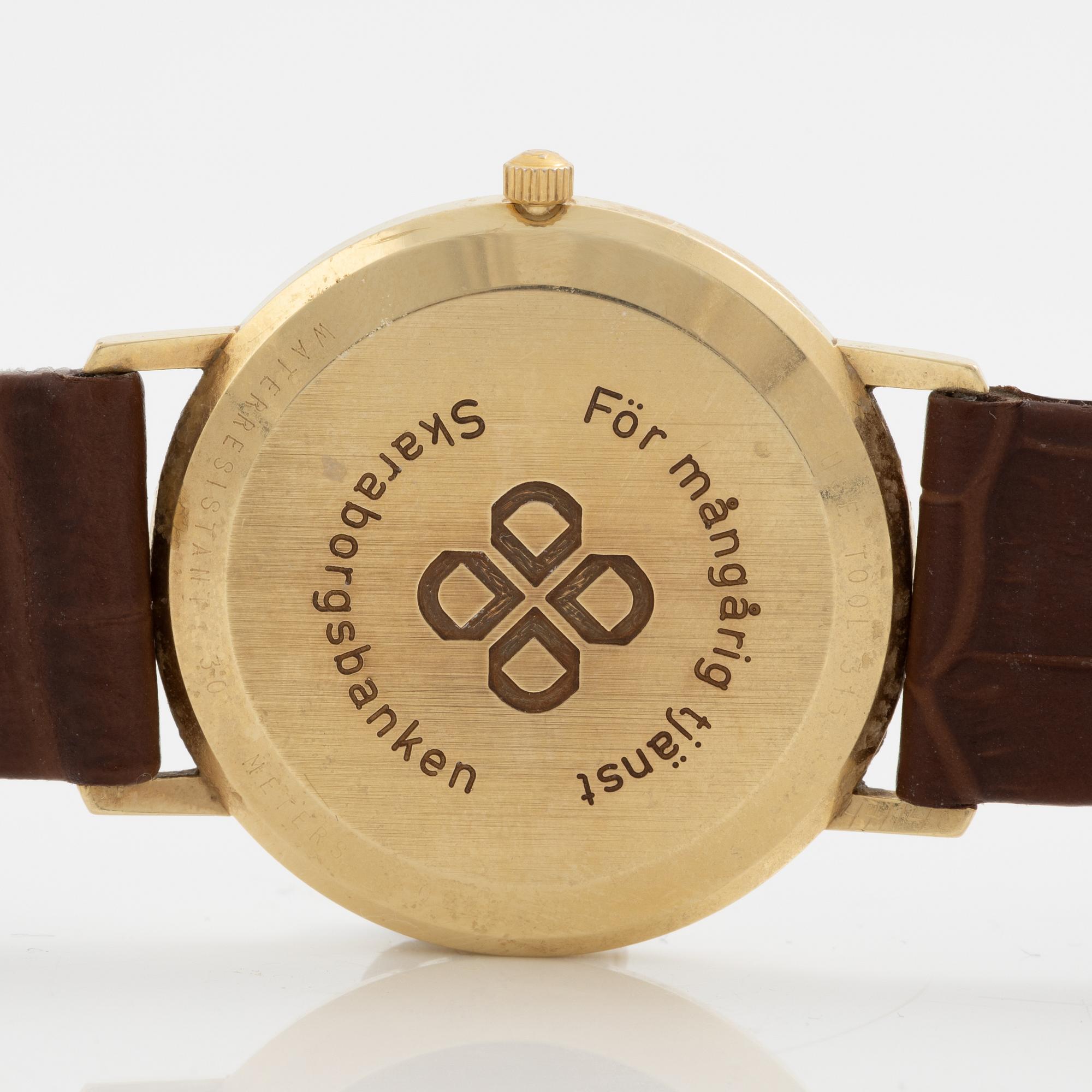 Omega, armbandsur, 14K guld, 33,5 mm.