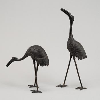 A pair of Chinese metal cranes, first half of the 20th century.